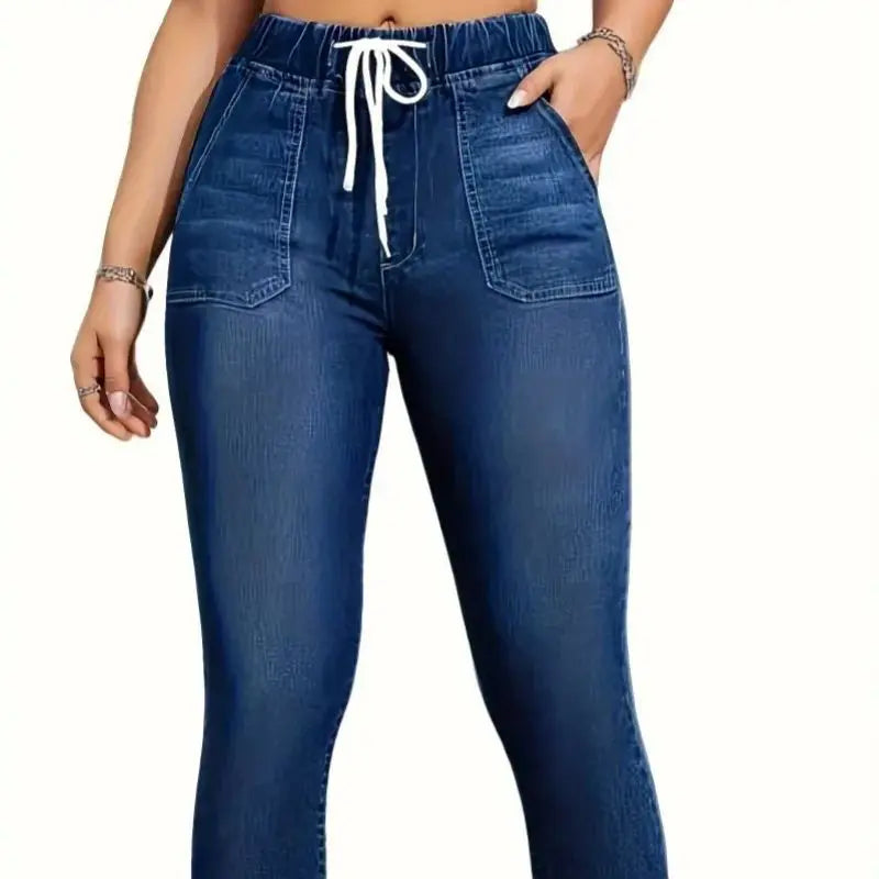 Women's high-waisted skinny jeans with drawstring waist, elastic cuffs, and slimming fit