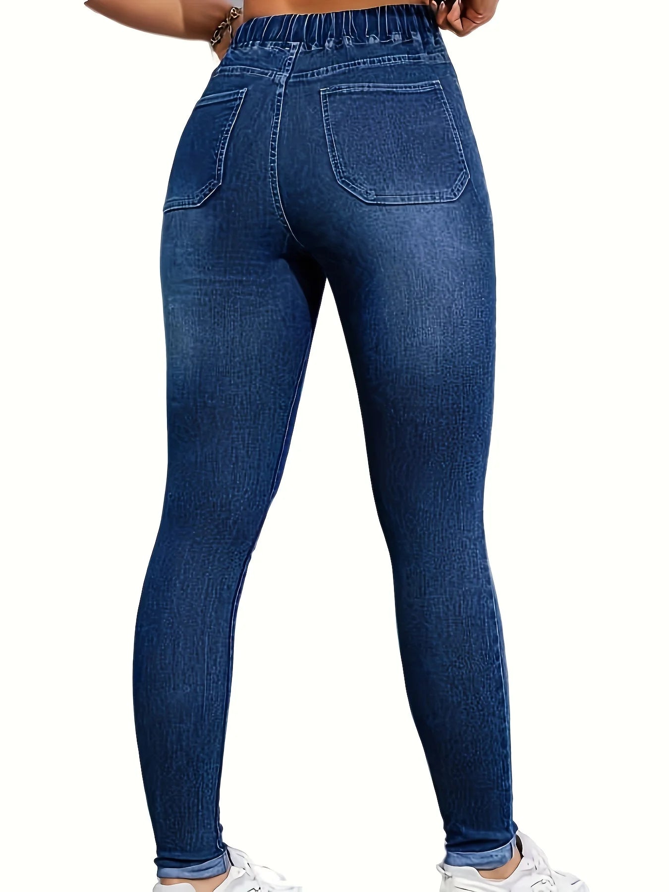 Women's high-waisted skinny jeans with drawstring waist, elastic cuffs, and slimming fit